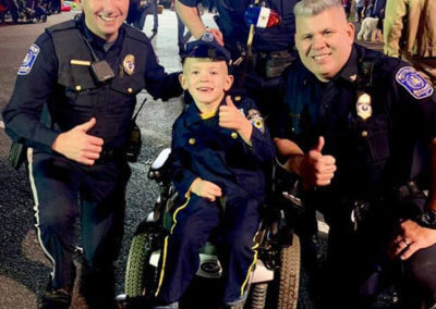 Police with Boy at Event